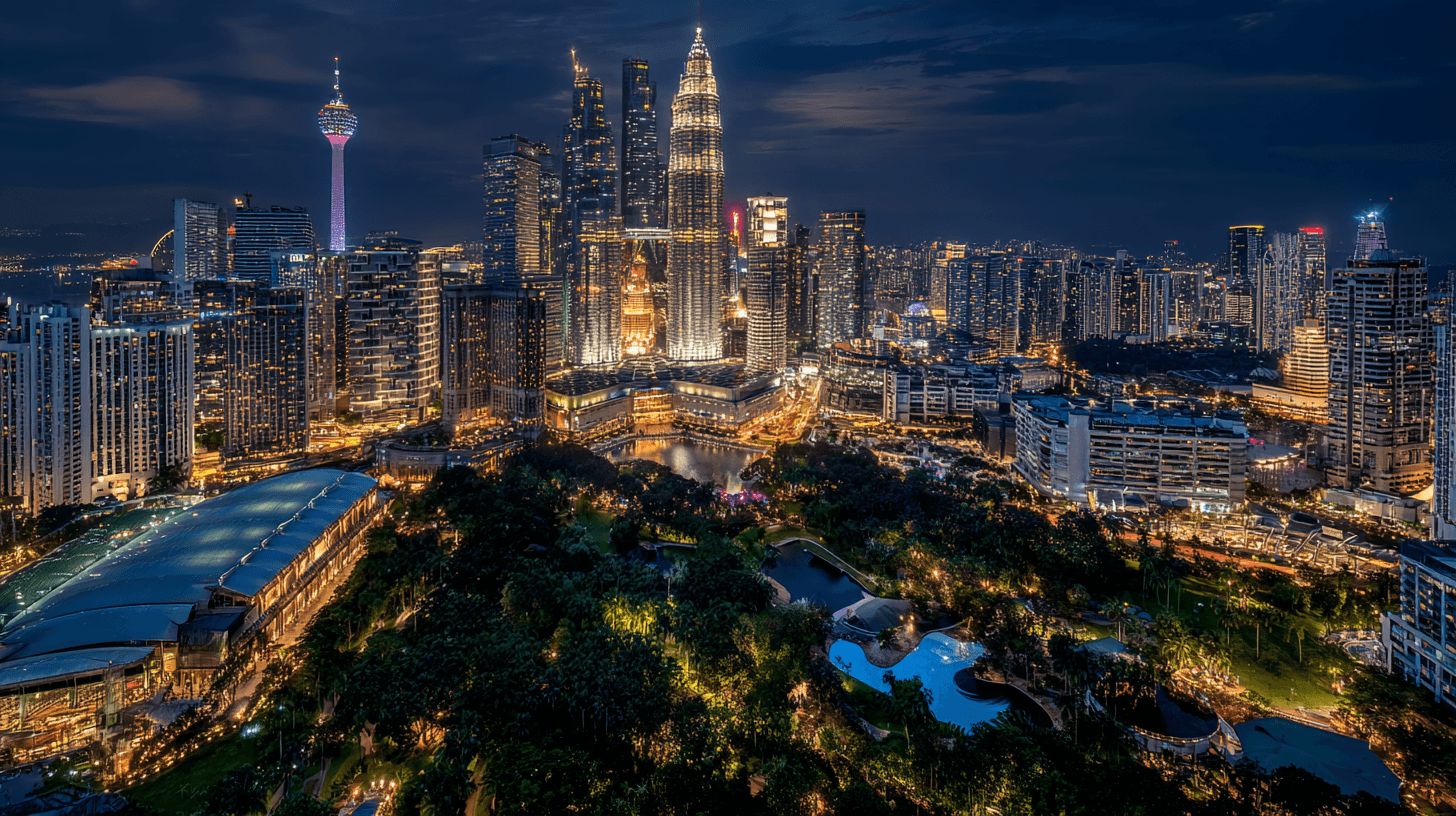 Night view of Kuala Lumpur city with Petronas Towers and vibrant skyline, showcasing Malaysia's modern charm